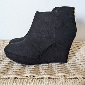 Black wedge booties